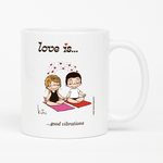 Load image into Gallery viewer, Front view: Love is... good vibrations  personalized ceramic mug by Kim Casali. 
