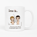 Load image into Gallery viewer, Front view: Love is... knowing each other&#39;s complicated coffee  personalized ceramic mug by Kim Casali. 
