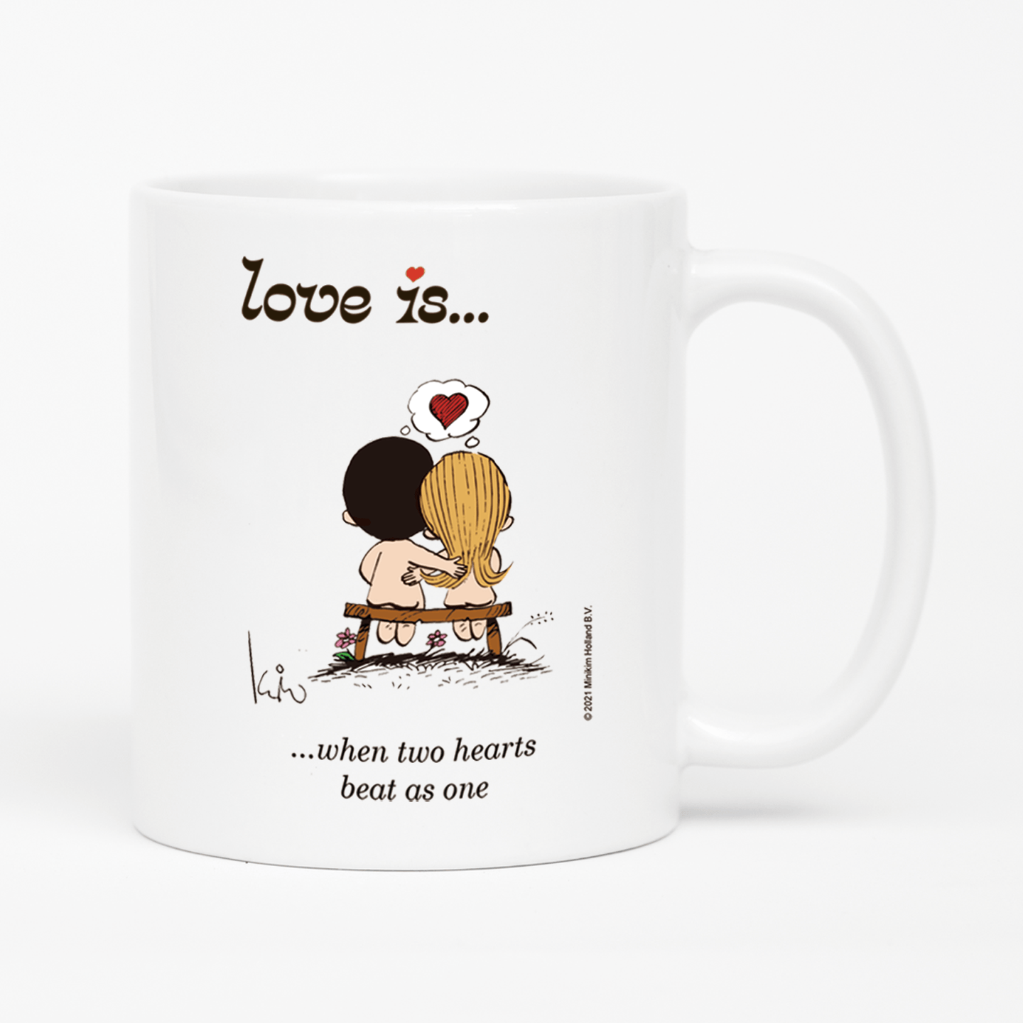 Front view: Love is... when two hearts beat as one personalized ceramic mug by Kim Casali.